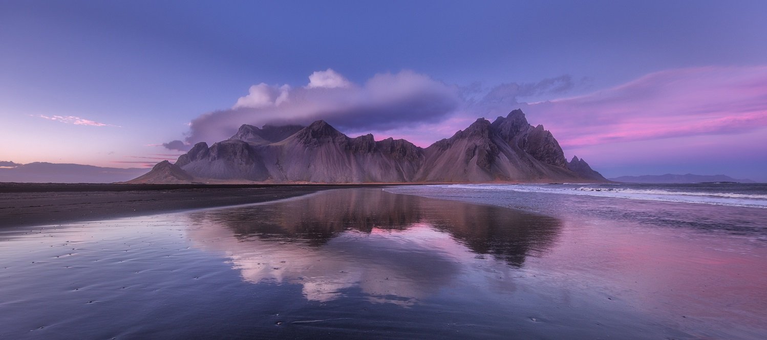 Mouantain Vestrahorn in South-East Iceland. Photo by Luca Micheli on Unsplash